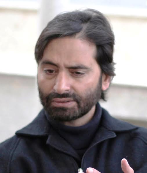 Malik condemns Peshawar university attack, killing at Pulwama